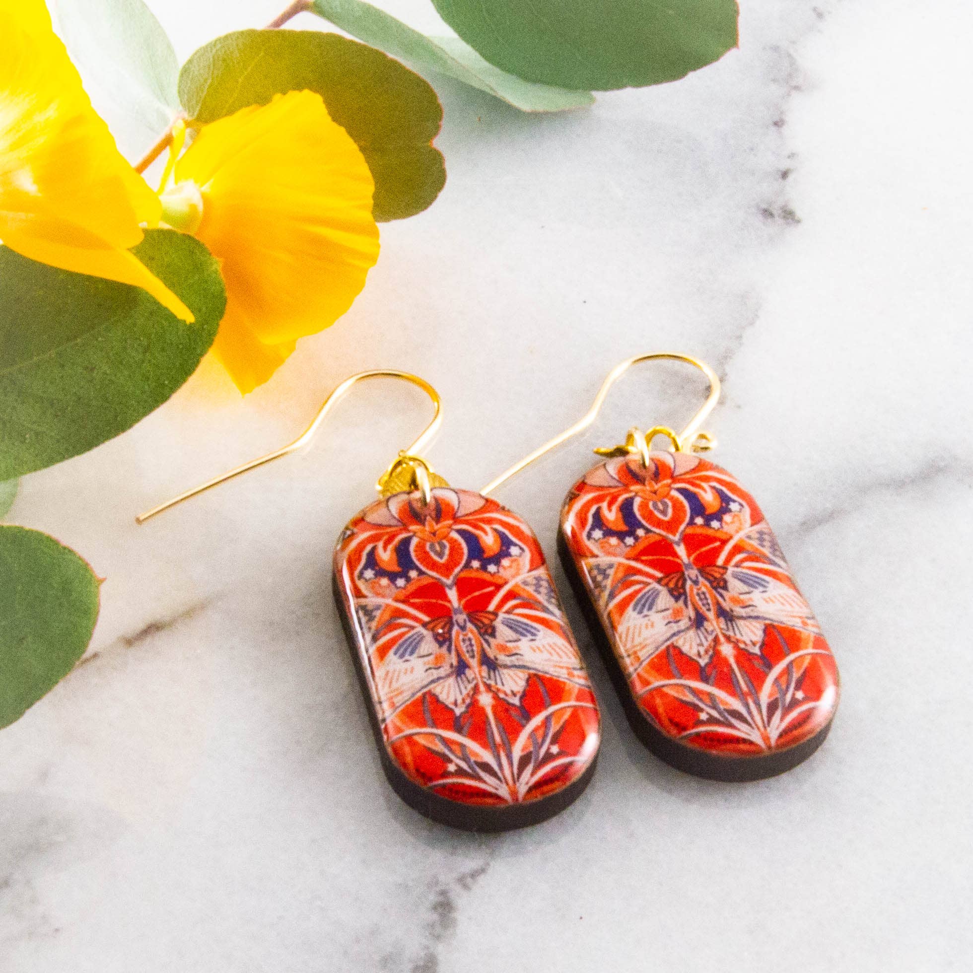 Orange + Navy Moth Motif Oblong Earrings, photo 1 of 2